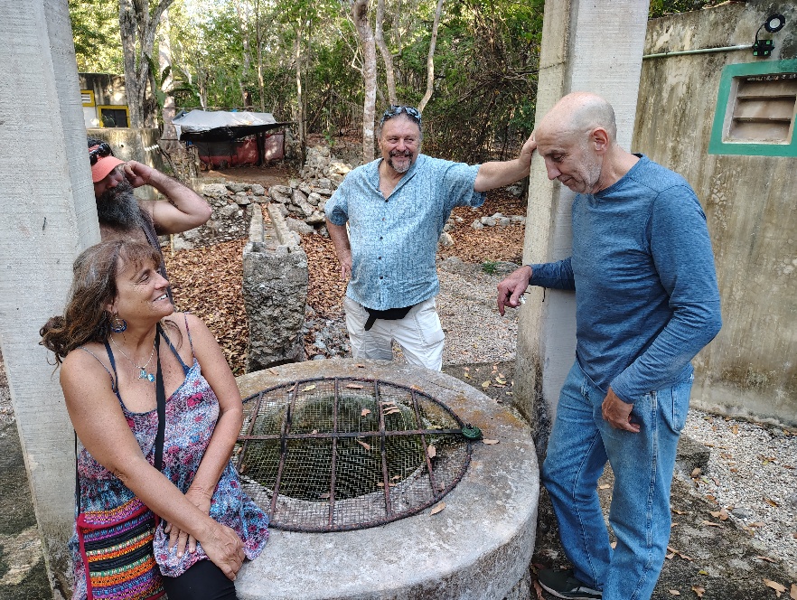 A picture of Jiva, Sundance, Diego and David at the original well